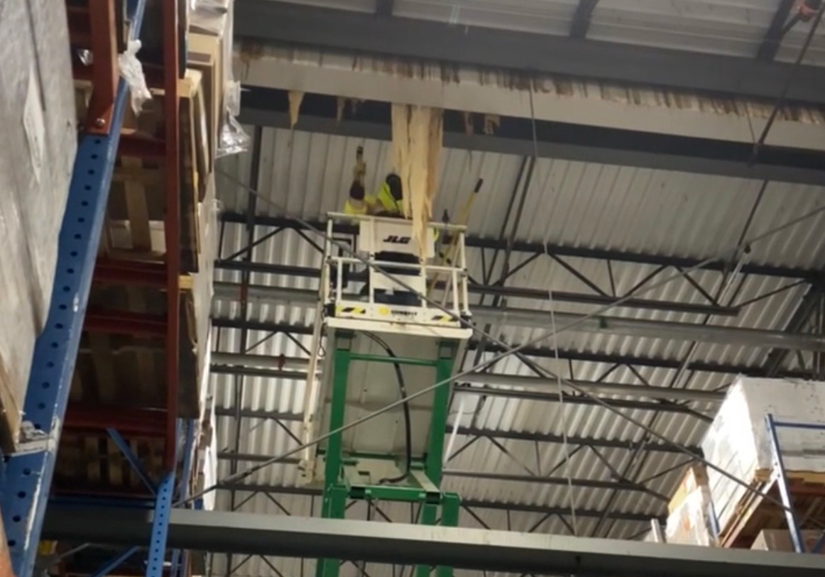 Industrial freezer warehouse interior cleared of ice